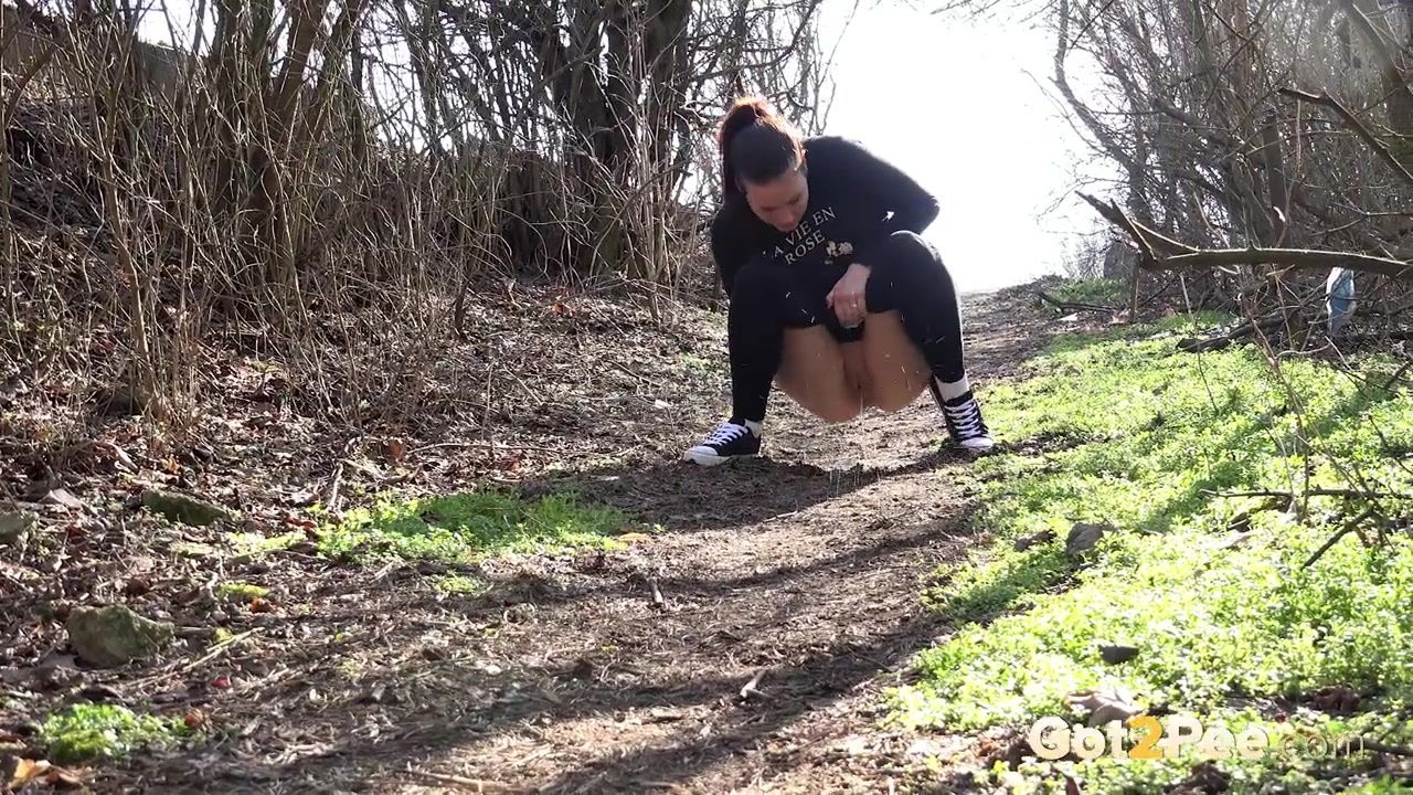 Amanda Hill enjoys a long piss outside in country